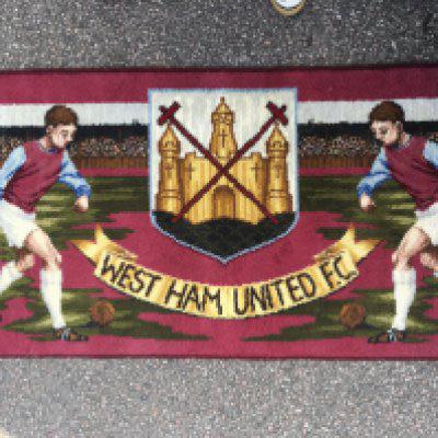 1960s West Ham Footballer Rug: Original Axminster rug with label stating honours up to 1965. Large rug measuring 50 x 27 inches in good condition although would have had tassels either side originally.