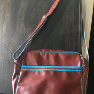 West Ham Aston Villa Burnley 1970s Fred Perry Shoulder Bag: Excellent condition 50 year old soft leather original Fred Perry bag with strap. Claret bag with light blue piping and very fashionable currently. Excellent condition.