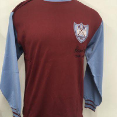 West Ham 1964 FA Cup Final Signed Football Shirt: Claret and blue brand new with tags retro shirt with Wembley 1964 to breast below West Ham badge. Signed to front by Ron Boyce who has written The Winner which is reference to his 90th minute winning goal. Coa from reputable source.