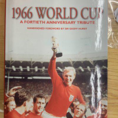 England 1966 World Cup Signed Book: 40th Anniversary book named 1966 World Cup by Terry Baker a hard back book with excellent dust jacket produced in 2006. Signed neatly inside page by 9 players excluding both Bobbys.
