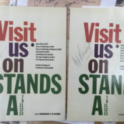 Signed Football Memorabilia: Box of programmes, signed pages and an autograph book. C/W pre printed autographs on Typhoo cards. Worth a look as has some signed club headed papers and two of Alf Ramsey.