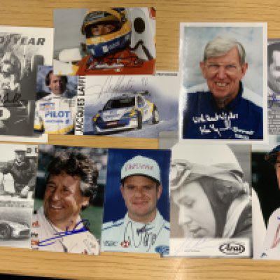 Signed Formula One Photos: Mainly postcard size photos hand signed without dedication. Includes Surtees Moss Brabham Schumacher Tyrrell Laffite and others. (10)