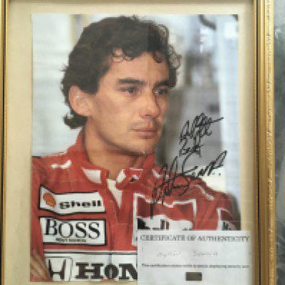 WITHDRAWN - Ayton Senna Signed Framed Formula One Poster: All the best Ayton Senna signed clearly in marker pen. 11 x 9 inch poster which can be removed from frame if posting required. There is a Coa although we do not know company and a note to rear states it was obtained in 1990.