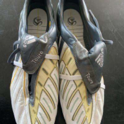 Kolo Toure Match Issued Adidas Predator Football Boots: Immaculate pair of boots so possibly not worn. Lace covering tongue has the Adidas logo and the word Toure to each boot. Stunning boots from the Arsenal Liverpool Manchester City Celtic and Ivory Coast player.