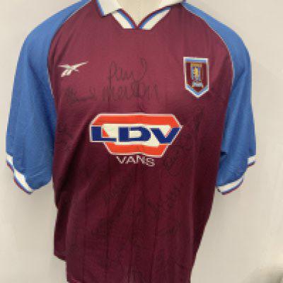 Aston Villa 98/99 Squad Signed Football Shirt: Home short sleeve shirt with LDV sponsorship. Size 50/52 signed by lots of Villa players. Obtained by Paul Merson in his first season there.