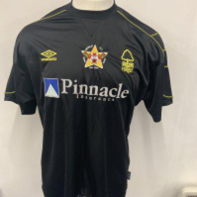 Nottingham Forest 2000 Mark Crossley Testimonial Football Shirt: Black short sleeve number 9 shirt. Front has usual Pinnacle sponsor and above that it states around a goalkeeper in a star badge Mark Crossley All Stars May 2000. Worn by Paul Merson.