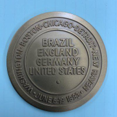Paul Merson 1993 England Tournament Participation Medal: USA tournament large (60cm) medal in a gold colour. U.S. Cup 93 to one side with the reverse stating Brazil England Germany United States with dates of tournament and venues.
