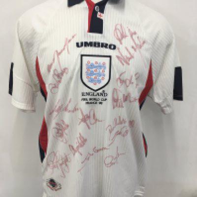Paul Merson England 1998 World Cup Match Issued Football Shirt: White short sleeve with blue collar. Under 3 Lions badge it is embroidered England FIFA WORLD CUP FRANCE 98. Merson only played once v Argentina and swapped his shirt. Signed by 15 team mates.