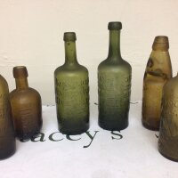Two German 19th century 1860-70 Mineral water chemist green glass bottles a Bullard & Sons bottle Norwich Groves & Whitnall glass Codd bottle a small Ross’s of Belfast bottle and crystal trade mark bottle Dover & Folkestone.  All in good condition no obvious faults. No Reserve.