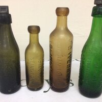 Four Antique green and brown glass bottles Indian tonic Mineral water and the Colchester Brewing Company. No obvious damage NO Reserve (4)