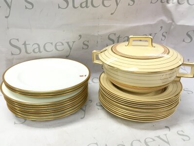 An Art Deco part dinner service, Wedgwood white glazed bowls and plates