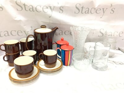 A collection of ceramics including Poole cups , saucers, tea jug, Whittard , glassware. No reserve