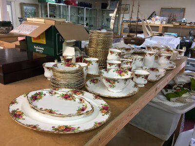 A large collection of Royal Albert old country roses including cups, saucers, plates etc