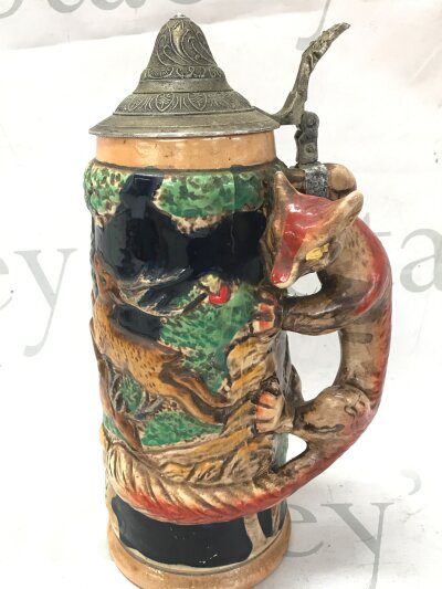 A vintage pottery beer stein with fox handle and music box inside, 25cm tall- NO RESERVE