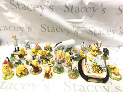 A Collection of Royal Doulton Disney porcelain Winnie the Pooh figures