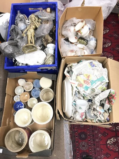 Four boxes of ceramics including a Staffordshire figure, apothecary jars, deity figure