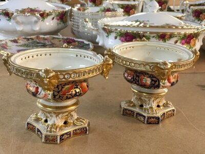 A pair of Royal Crown Derby Pot pourri  vessels , in the Imari pattern,  without lids- some damage