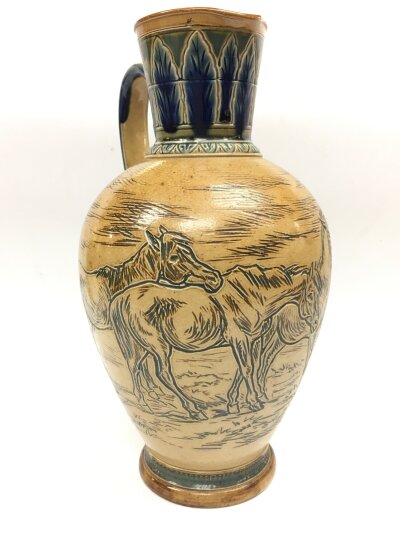 Hannah’s Barlow stoneware jug decorated with donkeys. 25cm tall. No obvious damage or restoration