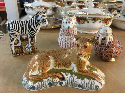 Four Royal Crown Derby paperweights in the form of Lioness, bear, walrus and zebra.  All with stoppers