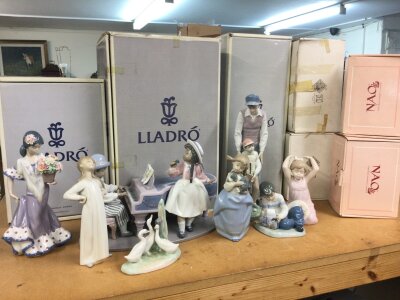 A collection of boxed Lladro and Nao porcelain figures including Jazz Duo, Flor Maria, like father like son. (8)