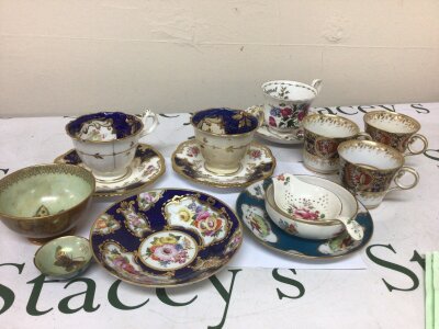 A Collection of 19th century and later ceramics including hand painted cups and saucers a Small Wedgwood lister bowl decorated with gilt Royal Albert cup and saucer and a Royal Crown Derby strainer and dish