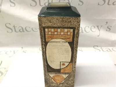 A large Troika Pottery vase with geometric design with decorators marks for Louise Jinks (worked at Troika between 1976 - 1981)
34cm tall 11cm wide. 
There is no signs of damage or repair vase is in good condition.