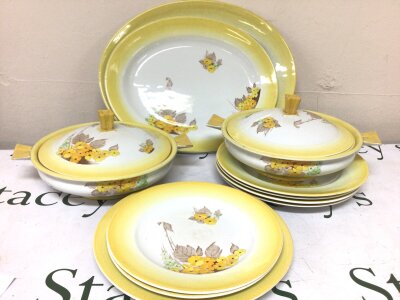 A Shelley porcelain part dinner service with two tureens of Art Deco design and plates