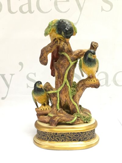A 20th Century Capodimonte figural group of birds, approx height 20cm.