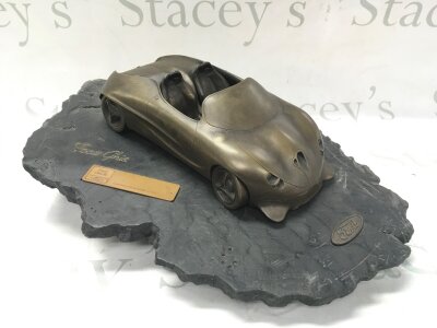 A limited edition sculpture model of the 1992 Ford Ghia Focus concept car. 23/100. 42cm long, 30cm wide, 15cm tall