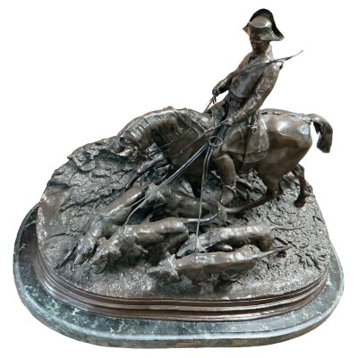 A bronze sculpture titled "Valet de chiens à cheval menant sa harde" (Mounted Huntsman and Hounds), originally modelled by the French sculptor Pierre-Jules Mêne in 1869, Width 80cm x Depth45cm x Height 64cm