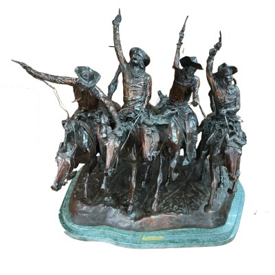A large cast bronze figure depicting a Mid Western cowboys scene, titled “Coming through the Rye” modelled by Frederick Remington.