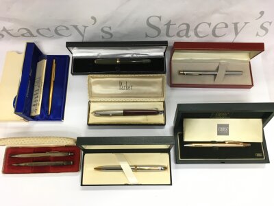 A collection of boxed pens comprising Cross, Sheaffer and Parker examples.