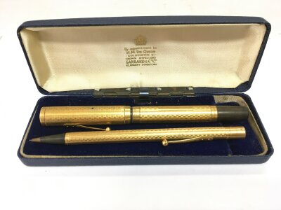 A cased Watermans pen and propelling pencil set.