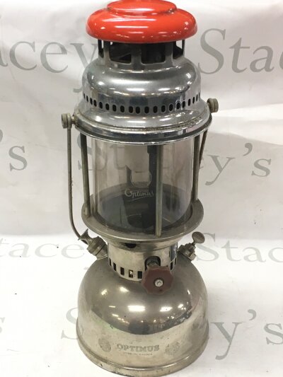 A vintage Swedish Optimus chrome kerosene lamp with a red top. 42cm tall