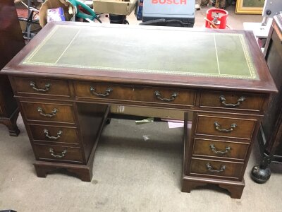 A mahogany pedestal desk, dimensions 122cm wide ,60cm long, 76cm tall