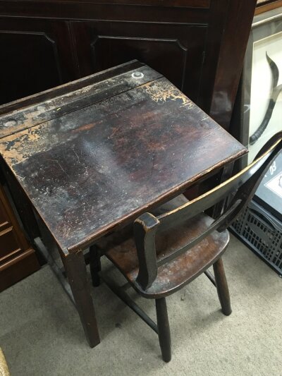 A wooden child's school desk, dimensions 65cm tall,53cm wide 45cm long. No reserve