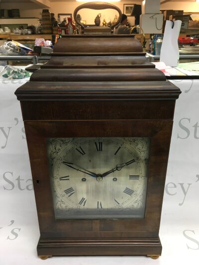 A mahogany eight day bracket clock with silvered dial, approx 53cm.