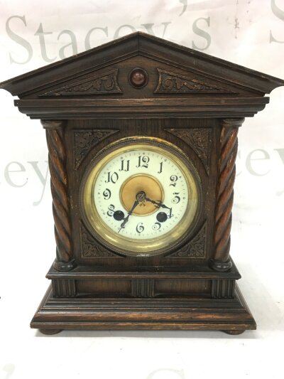 A small wooden mantle clock , H.A.C 8 day made in Württemberg. 22cm wide 26cm tall 14cm deep- NO RESERVE