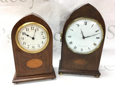 Two Edwardian mahogany mantle clocks , Swiss made and Comitti of London. 23 and 26cm tall.