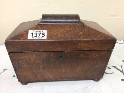 A late George III Mahogany tea caddy with two compartments complete with a quantity of tea bags.- NO RESERVE