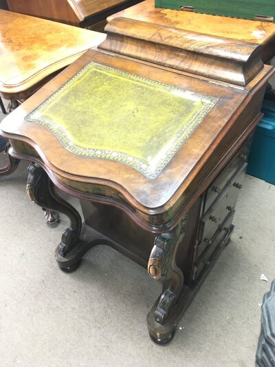 A Victorian walnut Davenport. 54cm wide , 85cm tall, 57cm long