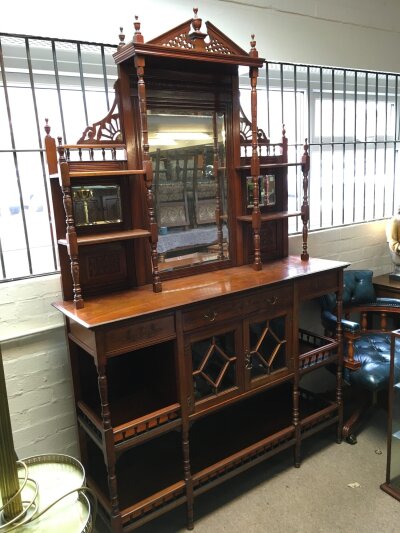 A Walnut Chiffonier with carved details, turned supports, and bevelled glass mirrors. Dimensions 215cm tall approx. 138cm wide 40cm long- NO RESERVE