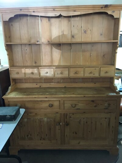 A pine dresser with a raised back with spice drawers and open shelves above drawers and cupboards 156cm wide- NO RESERVE