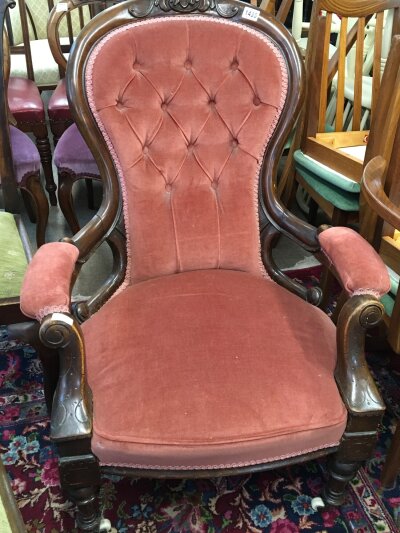 A Victorian mahogany open arm chair with a shaped back scroll arms and tapering legs.- NO RESERVE