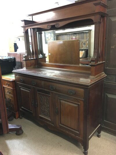 An Edwardian large walnut sideboard with mirrored back, dimensions 150cm wide , 194cm tall , 54cm long- NO RESERVE