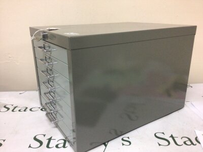 A metal coin collectors cabinet with seven drawers each with a detachable soft pad with key height 30cm depth 46cm- NO RESERVE