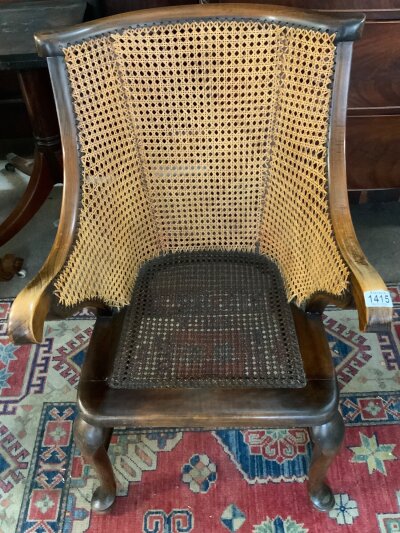 A vintage 1920s Bergere arm chair.- NO RESERVE