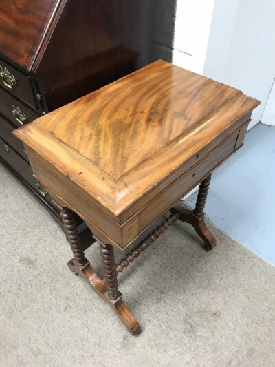 A mahogany work box featuring barely twist legs. 52cm wide, 75cm tall , 36cm long