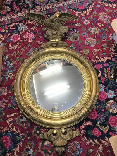 A Regency Convex wall mirror. 65cm wide