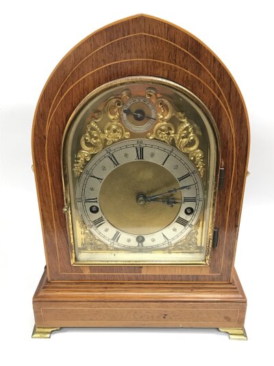 A late 19th century mantle clock with a three train movement. 23cm wide 31cm tall 17cm long